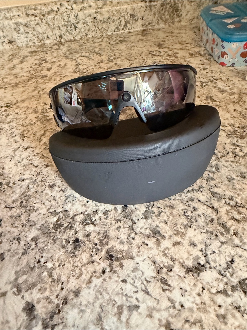 Oakley Black Frame Sunglasses with Mirrored Lens